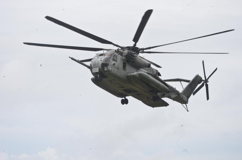 A U.S. CH-53E Super Stallion helicopter manuevers in position during training exercise with Philippine Marines September 20, 2013 in Cavite province, Philippines.