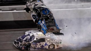 Ryan Newman (6) goes airborne after crashing with Corey LaJoie (32) during the NASCAR Daytona 500 auto race Monday, Feb. 17, 2020, at Daytona International Speedway in Daytona Beach, Florida. A statement from NASCAR said Newman's injuries, although serious, was not life threatening.