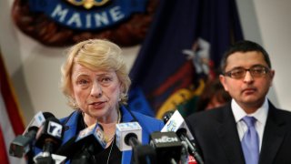 Gov. Janet Mills and Dr. Nirav Shah discussing coronavirus at a news conference at the State House on March 12, 2020, in Augusta, Maine.