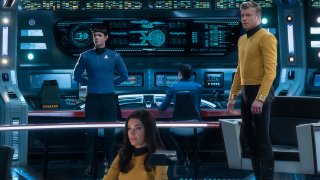 This image released by CBS All Access shows, from left, Ethan Peck as Spock, Rebecca Romijn as Number One, and Anson Mount as Captain Pike of the the CBS All Access series "Star Trek: Strange New Worlds."
