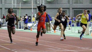 Bloomfield High School's Terry Miller, second from left, wins the final of the 55-meter dash over Andraya Yearwood, far left, and other runners in the Connecticut girls Class S indoor track meet at Hillhouse High School in New Haven, Connecticut.