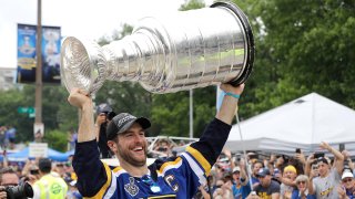 St. Louis Blues defenseman and captain Alex Pietrangelo carries the Stanley Cup during the Blues' NHL hockey Stanley Cup victory celebration in St. Louis on Saturday, June 15, 2019.