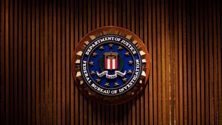 FILE - A crest of the Federal Bureau of Investigation is seen on Aug. 03, 2007 inside the J. Edgar Hoover FBI Building in Washington, DC.