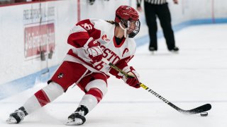 Sammy Davis of Boston University looks to pass during a game against the University of New Hampshire