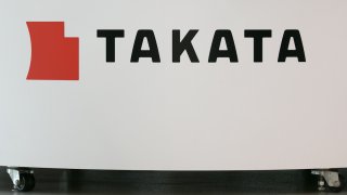 A Takata Corp. logo is seen on display at a car showroom on June 26, 2017 in Tokyo, Japan. Japanese air bag maker Takata Corp. has filed for bankruptcy protection in Tokyo and the U.S. on June 26, 2017, overwhelmed by the outcome following its production of faulty air bag inflators that are linked to the death of more than 180 people globally. The company announced most of its assets will be bought by the Detroit rival, Key Safety Systems for about $1.6 billion (175 billion yen). (Photo by Christopher Jue/Getty Images)