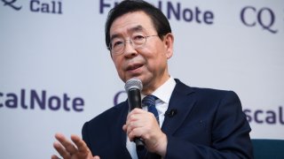 In this Jan. 13, 2020, file photo, Seoul Mayor Park Won-soon attends a question and answer session after a tour of FiscalNote and CQ-Roll Call, Inc via Getty Images offices in Washington.