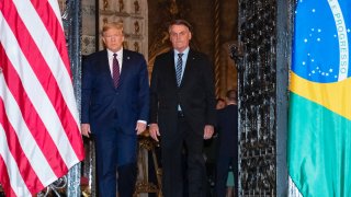 President Donald Trump arrives before a dinner with Brazilian President Jair Bolsonaro at Mar-a-Lago