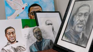 Artwork sent by the public intended for George Floyd's family is seen in the law offices of Benjamin Crump, June 15, 2020, in Tallahassee, Fla.