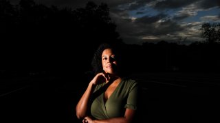 In this July 24, 2020, file photo, Charisse Davis poses for a portrait in Marietta, Ga. Davis was recently elected the only Black woman on the Cobb County School Board. "We've been watching from the sidelines and allowing other people to take their turns, and take these positions of power," Davis said. "Now here we are to essentially fix it."