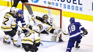 Ondrej Palat #18 of the Tampa Bay Lightning scores a goal past Jaroslav Halak #41 of the Boston Bruins during overtime to win Game Two of the Eastern Conference Second Round during the 2020 NHL Stanley Cup Playoffs at Scotiabank Arena on August 25, 2020 in Toronto, Ontario.