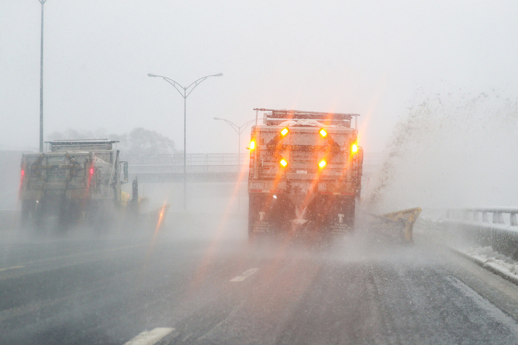 Plow working the Mass Pike East in Boston.