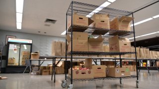 Boxes of grocers are on a large cart