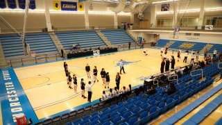 WORCESTER, MA - MARCH 12: Maynard High and Monson High make their introductions to an empty court with no fans during the MIAA Girls Division IV at Worcester State University's John Brissette Competition Court on March 12, 2020 in Worcester, MA.