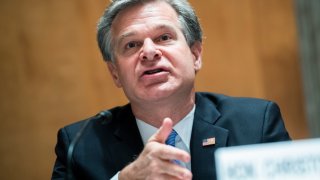In this Sept. 24, 2020, file photo, FBI Director Christopher Wray, testifies during the Senate Homeland Security and Governmental Affairs Committee hearing titled Threats to the Homeland, in Dirksen Senate Office Building.
