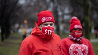 Chicago Teachers Union President Jesse Sharkey speaks ahead of a car caravan where teachers and supporters gathered to demand a safe and equitable return to in-person learning during the COVID-19 pandemic in Chicago, IL