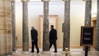 Senate Majority Leader Mitch McConnell (R-KY) heads towards his office from the Senate Floor at the U.S. Capitol on January 1, 2021 in Washington, DC. The Senate voted to pass the National Defense Authorization Act and override President Trump's veto for the first time during his presidency.