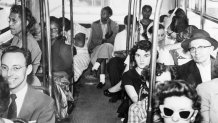 Riders continue to sit in segregated sections, due in part to pressure from white patrons, in this 1956 photo in Texas even as courts ruled to desegregate buses.