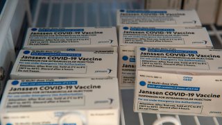 Johnson & Johnson Covid-19 Janssen Vaccine boxes sit in a locked refrigerator at the US Department of Veterans Affairs' VA Boston Healthcare System's Jamaica Plain Medical Center in Boston, Massachusetts on March 4, 2021.