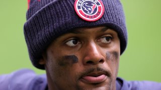In this Dec. 27, 2020, file photo, quarterback Deshaun Watson #4 of the Houston Texans walks off the field after a 37-31 loss to the Cincinnati Bengals at NRG Stadium in Houston, Texas.