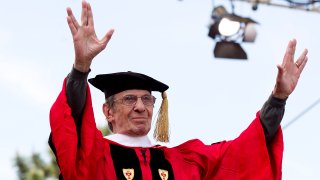 actor Leonard Nimoy makes the gesture that made him famous when he played Spock on "Star Trek" after receiving his honorary degree during a Boston University commencement ceremony on Nickerson Field in Boston