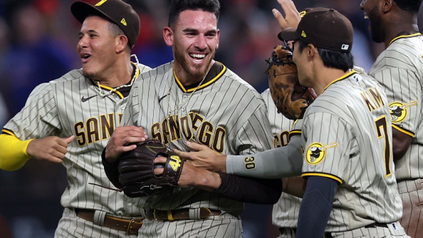 ARLINGTON, TEXAS – APRIL 09:  Joe Musgrove #44 of the San Diego Padres celebrates with his team after pitching a no-hitter against the Texas Rangers at Globe Life Field on April 09, 2021 in Arlington, Texas.  This was the Padres first no-hitter in franchise history.  (Photo by Ronald Martinez/Getty Images)