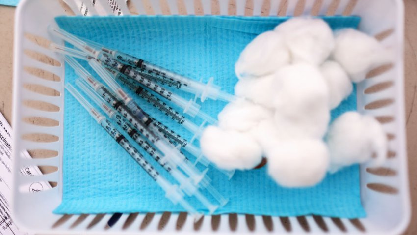 Syringes containing a dose of the Pfizer COVID-19 vaccine are viewed at a clinic targeting Central American Indigenous residents at CIELO, an Indigenous rights organization, on April 10, 2021 in Los Angeles, California. CIELO launched an outreach campaign for vaccinations to address language barriers, accessibility, mistrust of government and misinformation among Mexican and Guatemalan Indigenous residents. They have suffered disproportionately during the pandemic with many losing work in the hospitality industry. St. John’s Well Child and Family Center is administering COVID-19 vaccines across South L.A. in a broad effort to bring vaccines to minority communities.