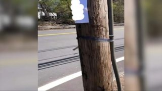 A sign with white supremacist speech (which has been blurred) was seen on a utility pole in Hanover, Massachusetts.