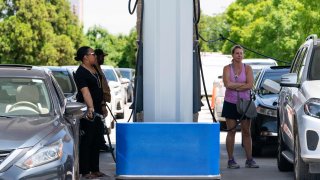 Consumers pump gas at a Costco gasoline station on May 11, 2021, in Atlanta, Georgia.