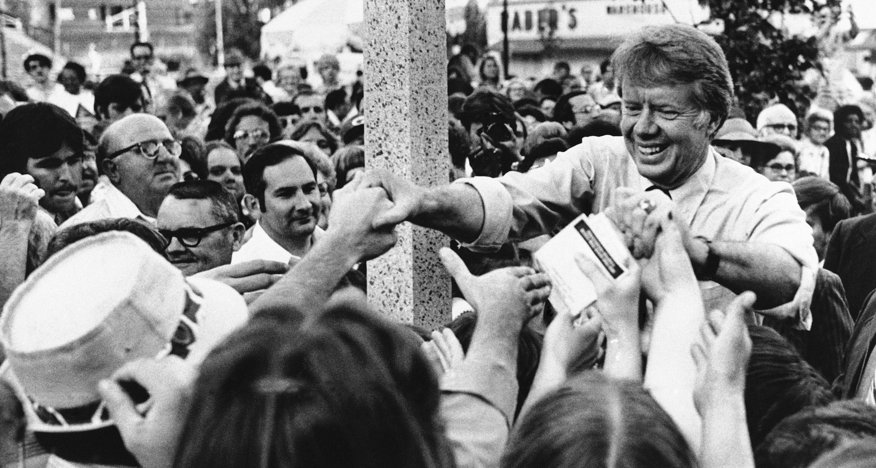 Former Georgia Gov. Jimmy Carter, right, with a crowd of 5,000 people at Youngstown’s Federal Plaza in Youngstown, Ohio, in his quest for support in Tuesday’s Ohio Democratic primary, June 7, 1976.