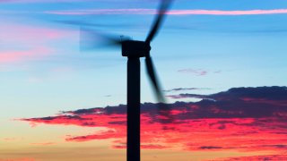 A wind turbine photographed in, Camelford, Cornwall, at sunset.