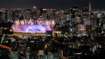 Fireworks seen over National Stadium during the opening ceremony of 2020 Tokyo Olympics, Friday, July 23, 2021, in Tokyo.