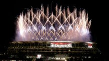 Fireworks seen over the National Stadium during the opening ceremony of the 2020 Summer Olympics, Friday, July 23, 2021, in Tokyo.