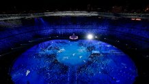 Doves are projected on the field during the opening ceremony at the Olympic Stadium at the 2020 Summer Olympics, Friday, July 23, 2021, in Tokyo.