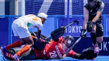 India midfielder Sumit (17) takes a shot on New Zealand goalkeeper Leon Hayward (20) during a men's field hockey match at the 2020 Summer Olympics, Saturday, July 24, 2021, in Tokyo, Japan.