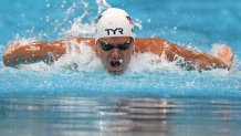 Michael Andrew of the United States swims in the men's 200-meter individual medley at the 2020 Summer Olympics, Wednesday, July 28, 2021, in Tokyo, Japan.