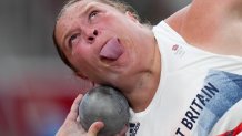 Sophie Mckinna, of Britain, competes in the qualification rounds of the women's shot put at the 2020 Summer Olympics, Friday, July 30, 2021, in Tokyo.