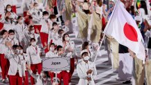 Flag bearers Yui Susaki and Rui Hachimura of Team Japan lead their team in during the Opening Ceremony of the Tokyo 2020 Olympic Games at Olympic Stadium on July 23, 2021 in Tokyo, Japan.