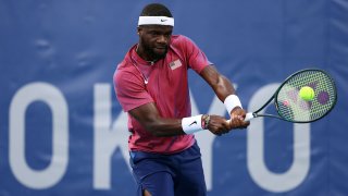 Frances Tiafoe competes in Tokyo