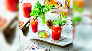 a Bloody Mary bar with celery and melons