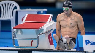 Rudy Garcia-Tolson of the U.S. prepares at the start of the men's swimming 100m breaststroke S6 final at the Tokyo 2020 Paralympic Games