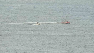 Boats were searching for a kayak that took on water near Boston on Tuesday, Sept. 7, 2021.