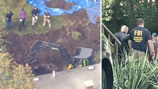 FBI agents searching a backyard in Randolph, Massachusetts
