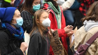 Greta Thunberg joins demonstrators during the Fridays For Future march on November 5, 2021 in Glasgow, Scotland.