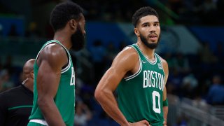 Nov 3, 2021; Orlando, Florida, USA; Boston Celtics forward Jayson Tatum (0) and guard Jaylen Brown (7) talk against the Orlando Magic during the second half at Amway Center. Mandatory Credit: Kim Klement-USA TODAY Sports