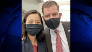 Boston Mayor Michelle Wu poses for a picture with former Mayor and current U.S. Labor Secretary Marty Walsh at the White House on Tuesday, Dec. 14, 2021.