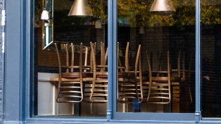 This file photo shows chairs on a table at a restaurant forced to close during a coronavirus lockdown.