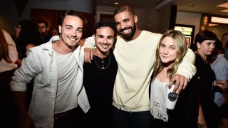 Drake (3rd from L) poses with "Degrassi" co-stars Daniel Clark, Adamo Ruggiero and Lauren Collins