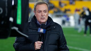 NBC Sports Reporter Al Michaels reports from the sidelines during warm ups before an NFL football game between the Pittsburgh Steelers and the Buffalo Bills in Pittsburgh, Sunday, Dec. 15, 2019.