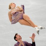 Alexa Knierim and Brandon Frazier, of the United States, compete in the pairs team free skate program during the figure skating competition at the 2022 Winter Olympics, Monday, Feb. 7, 2022, in Beijing.