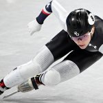 Team USA's Kristen Santos competes in a semi-final heat of the women's 1000m short track speed skating event during the Beijing 2022 Winter Olympic Games at the Capital Indoor Stadium in Beijing, Feb. 11, 2022.